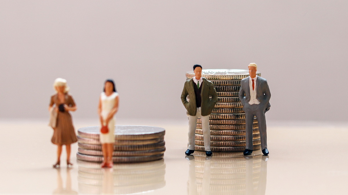 Two women stand in front of a small stack of coins. Behind them, two men stand in front of a coin stack double in size.