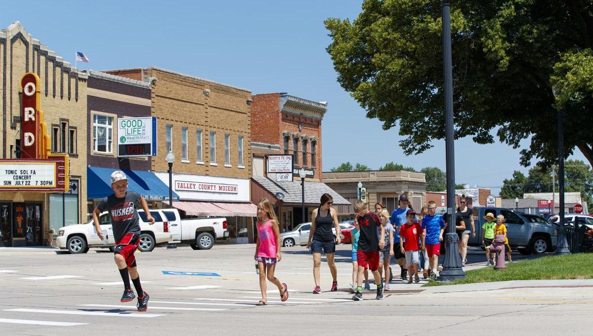 Students walk across the street in rural America