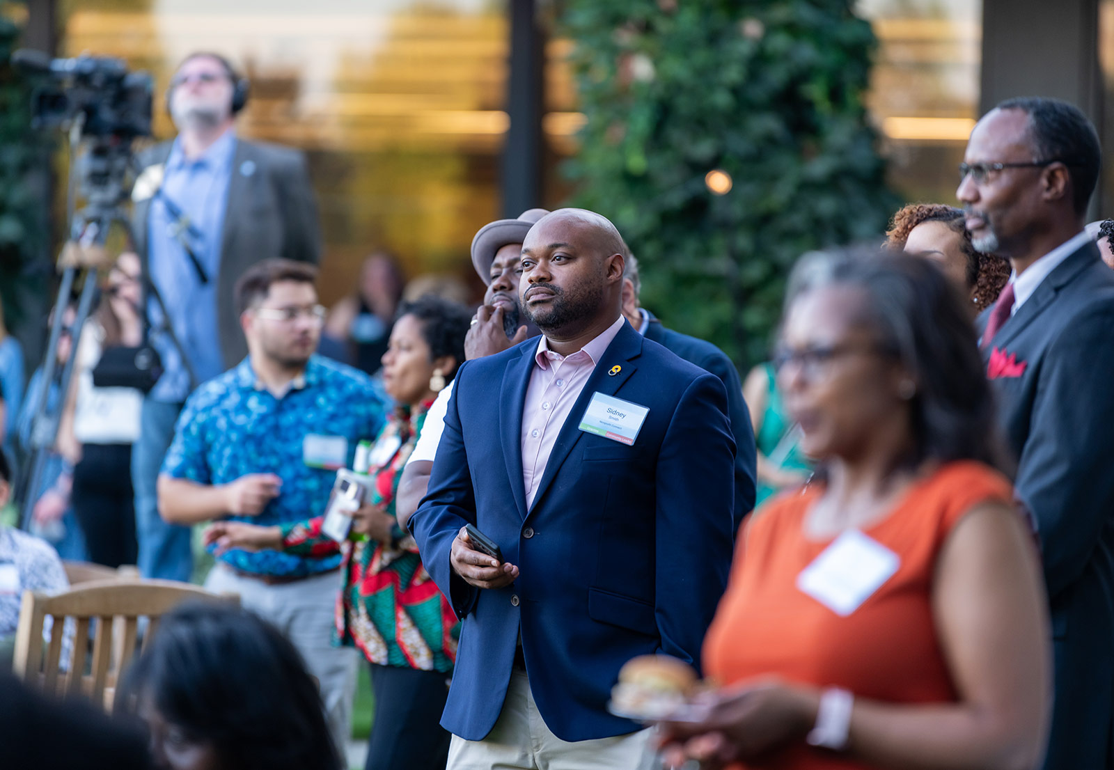 Community members listening to Dr. DeAngela Burns-Wallace's remarks at the Kauffman Foundation Open House event Sept. 28, 2023.