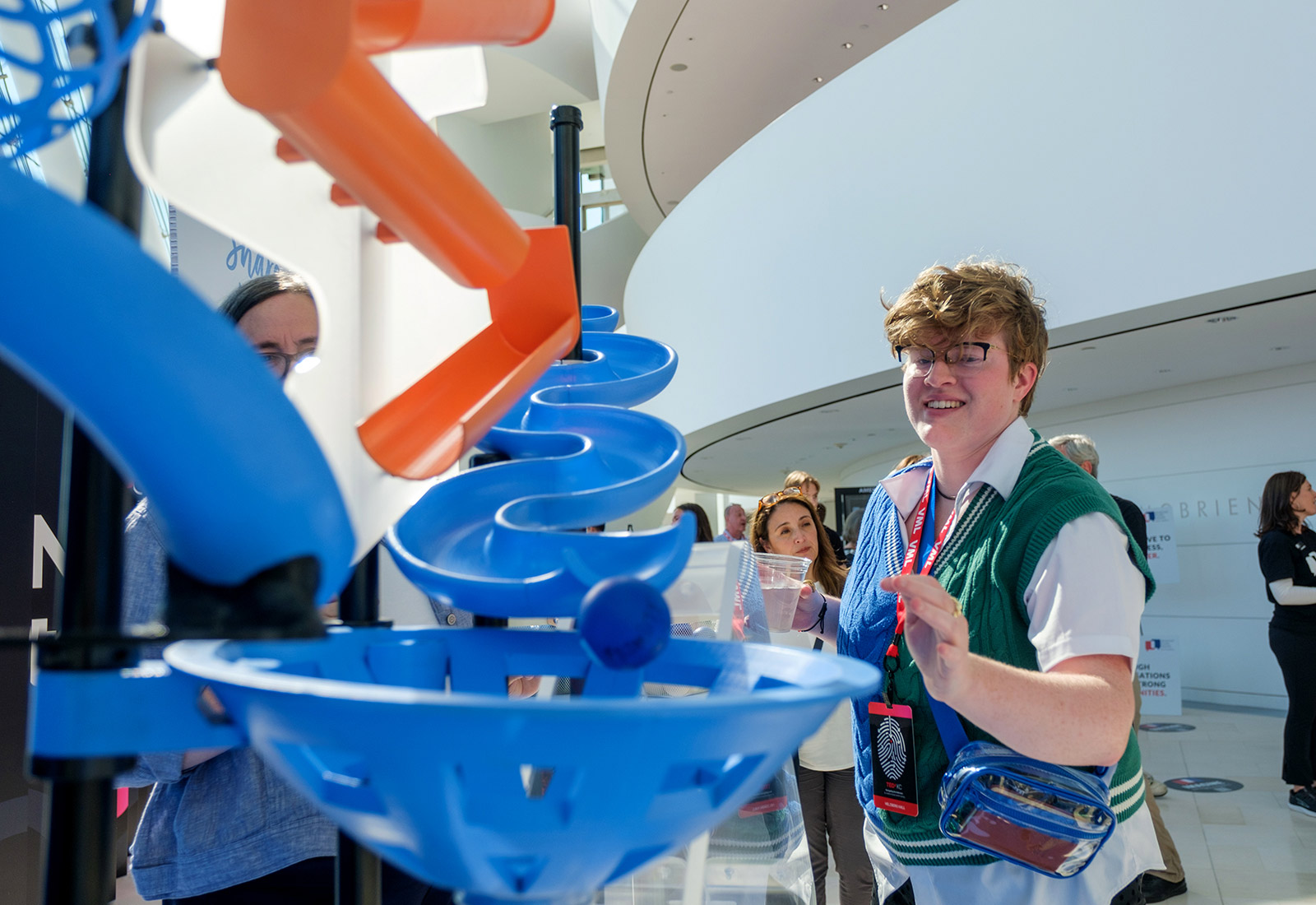 TEDxKC 2024 attendees share their big ideas at the Kauffman Foundation heart installation at the Kauffman Center for Performing Arts