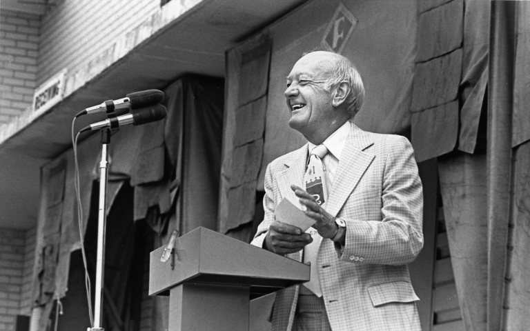 Ewing Marion Kauffman at a podium